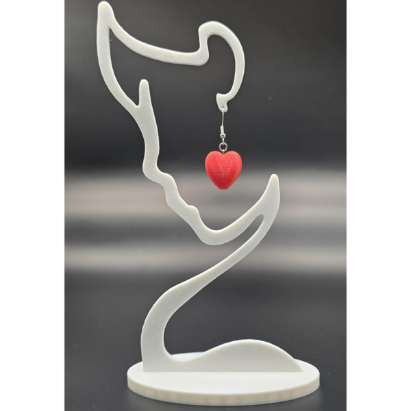 Heart_Earrings_On_Display pair of heart earrings on display stand