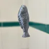 Fish light pull for a nautical themed bathroom